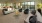 Lounge with couches, tables, chairs overlooking the patio